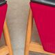 Pair of Drevotex Zamberk armchairs, red fabric and faux leather 1970