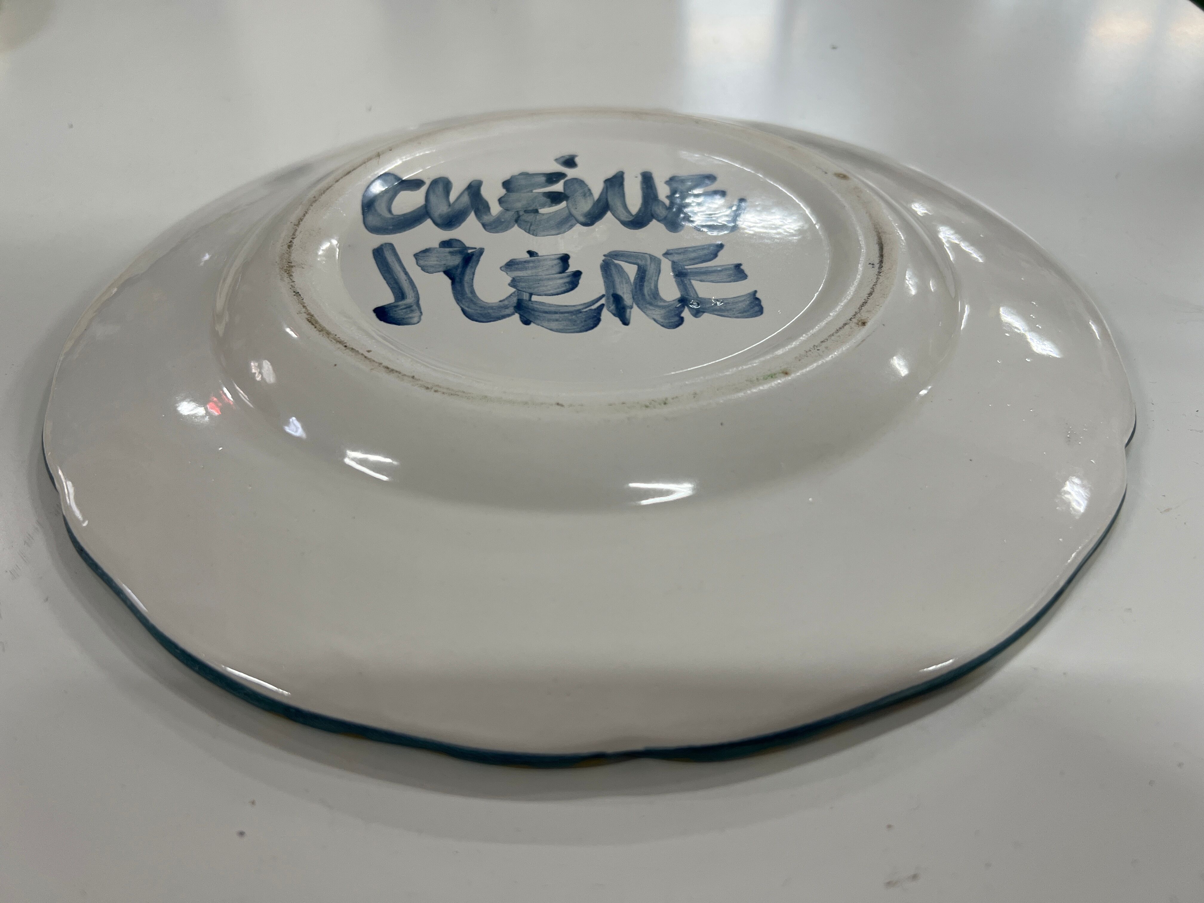 Painted and enamelled ceramic plate