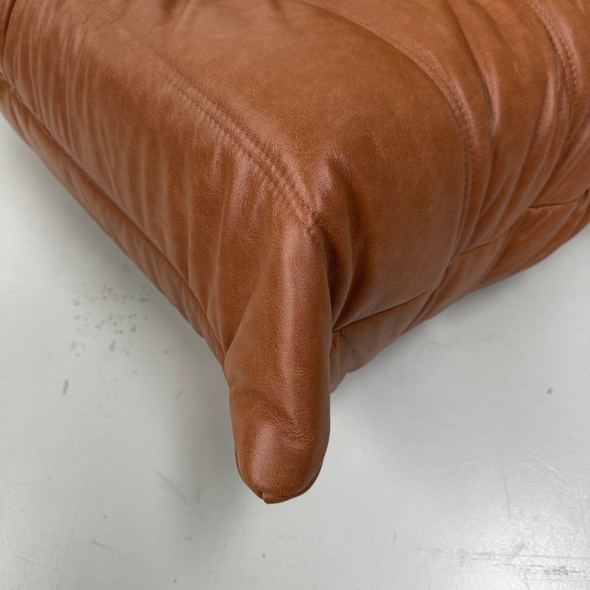 Togo Chair in Cognac Leather attributed to  Michel Ducaroy for Ligne Roset.