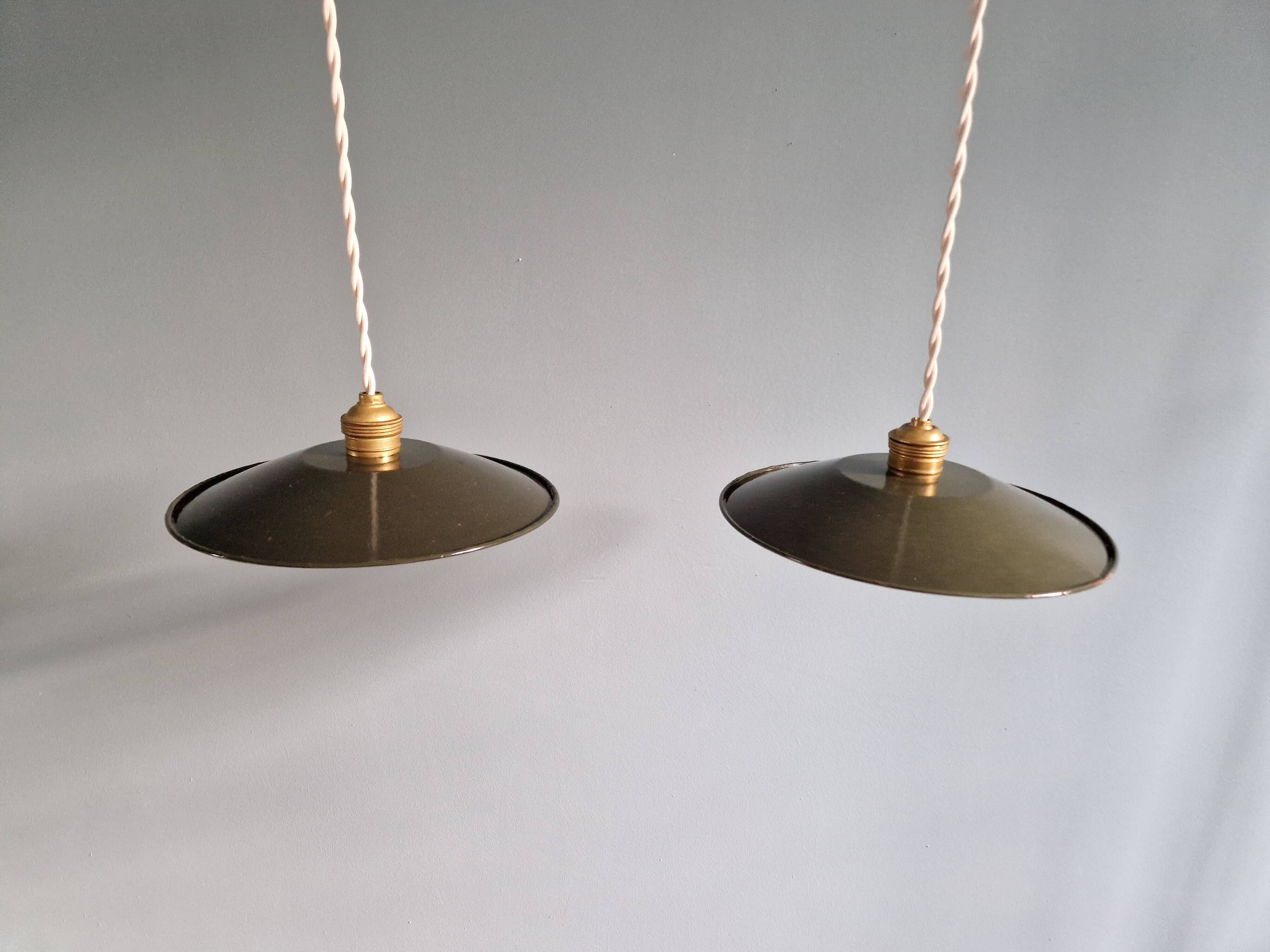 Pair of industrial pendant lights in olive green enameled sheet metal