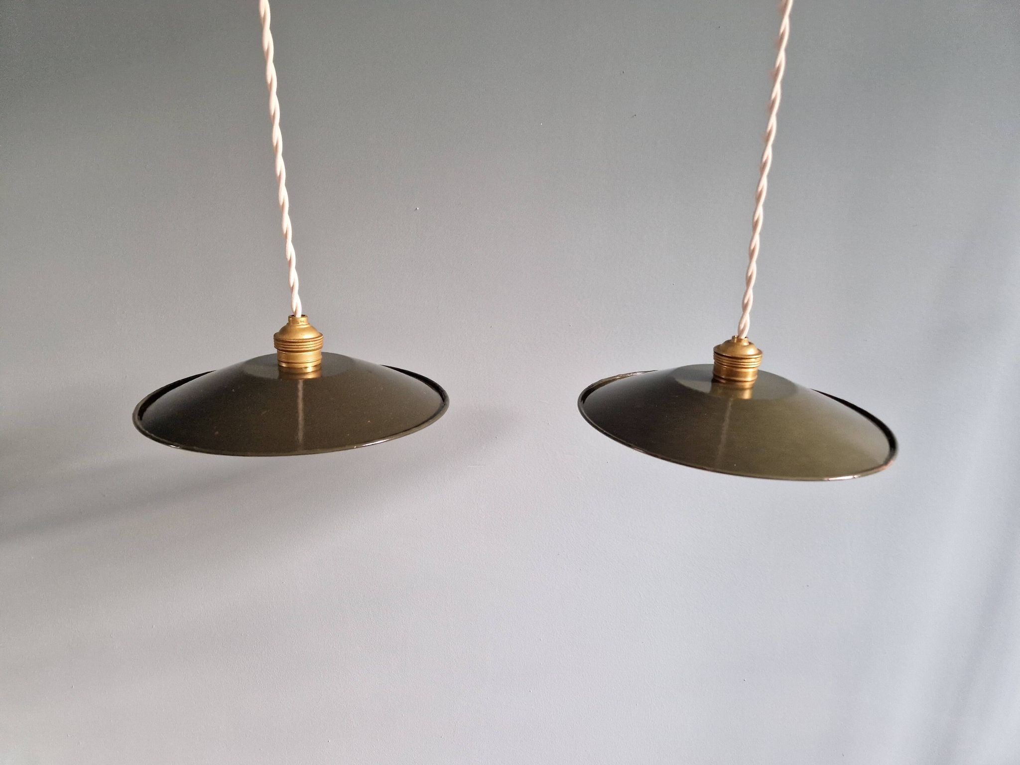 Pair of industrial pendant lights in olive green enameled sheet metal