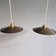 Pair of industrial pendant lights in olive green enameled sheet metal