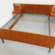 Vintage Scandinavian style double bed in teak from the 60s with integrated bedside lights