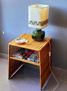 Wicker bedside table or side table from the 1960s.