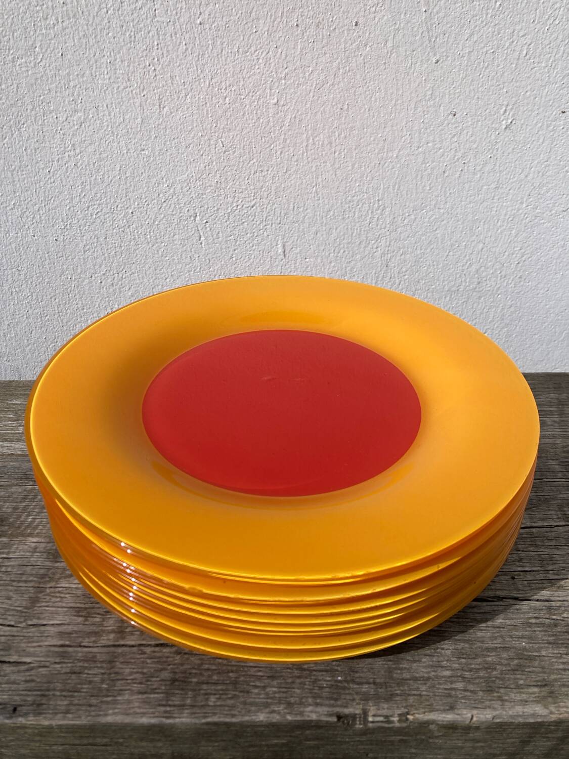10 yellow and orange glass dinner plates