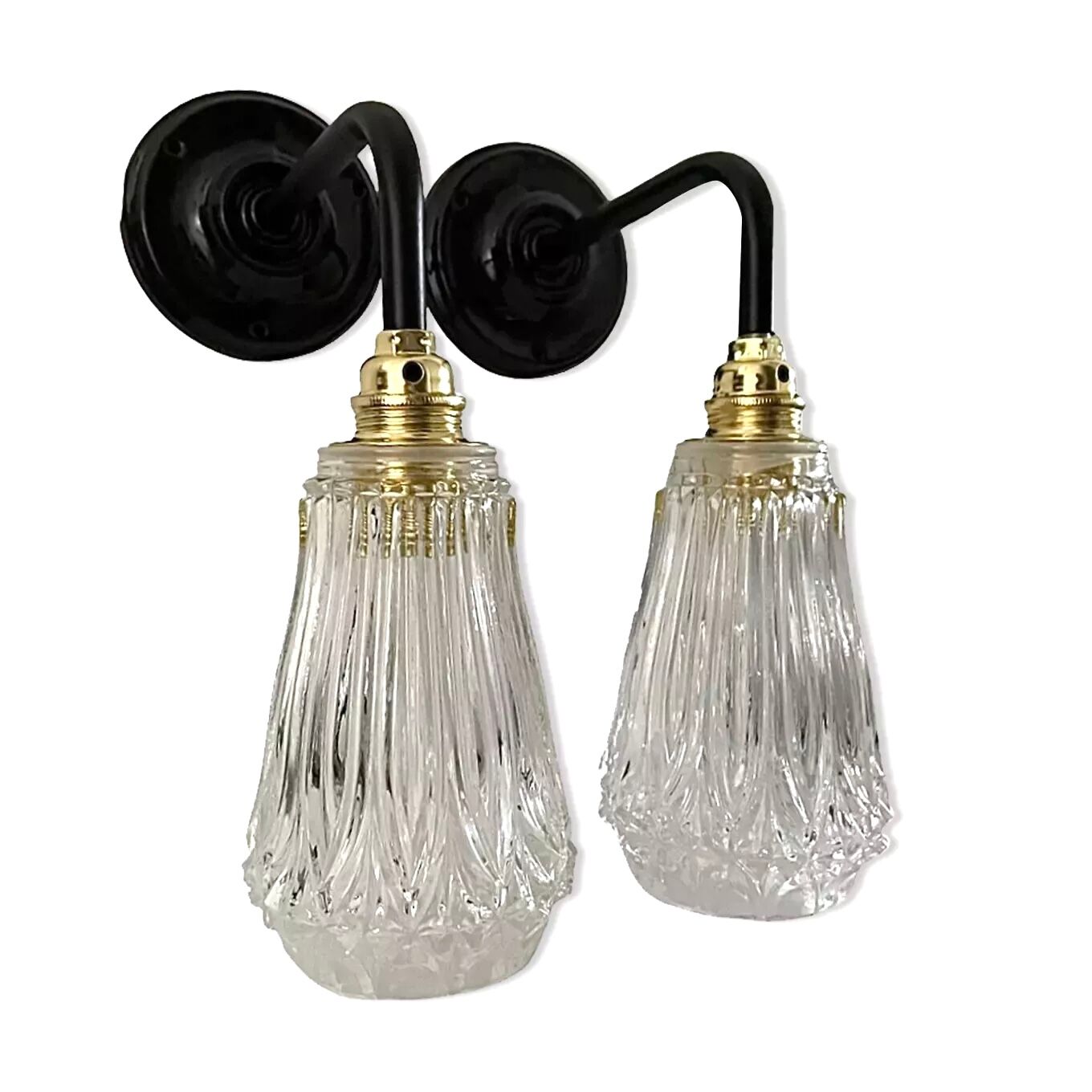 Set of two electrified chiseled glass sconces to nine