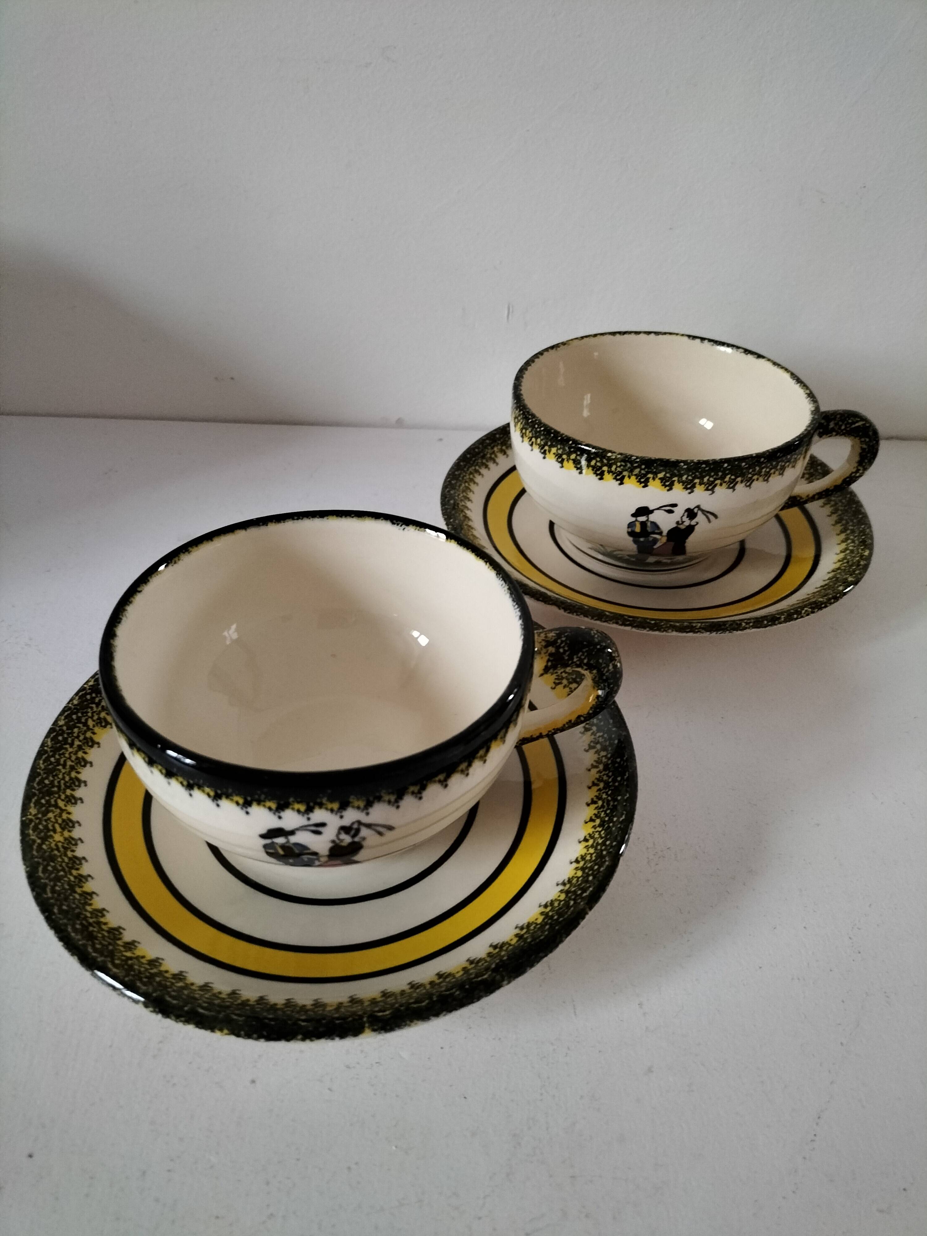 Two Henriot Quimper cups and saucers