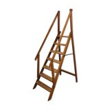Old wooden stepladder with bodyguards