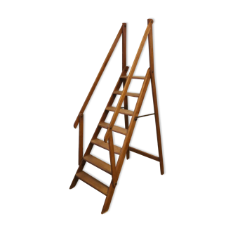 Old wooden stepladder with bodyguards