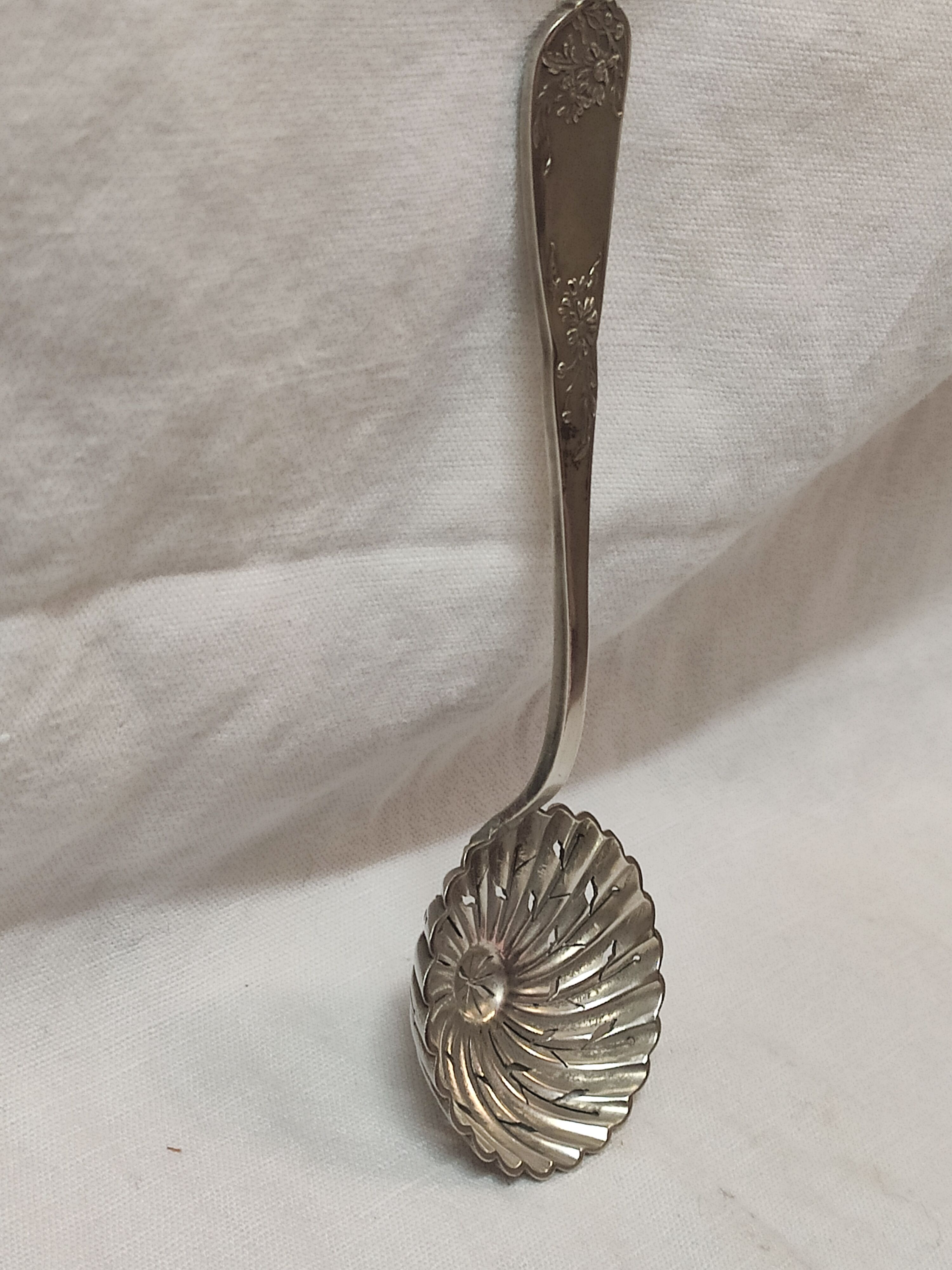 Sprinkled, silver metal.