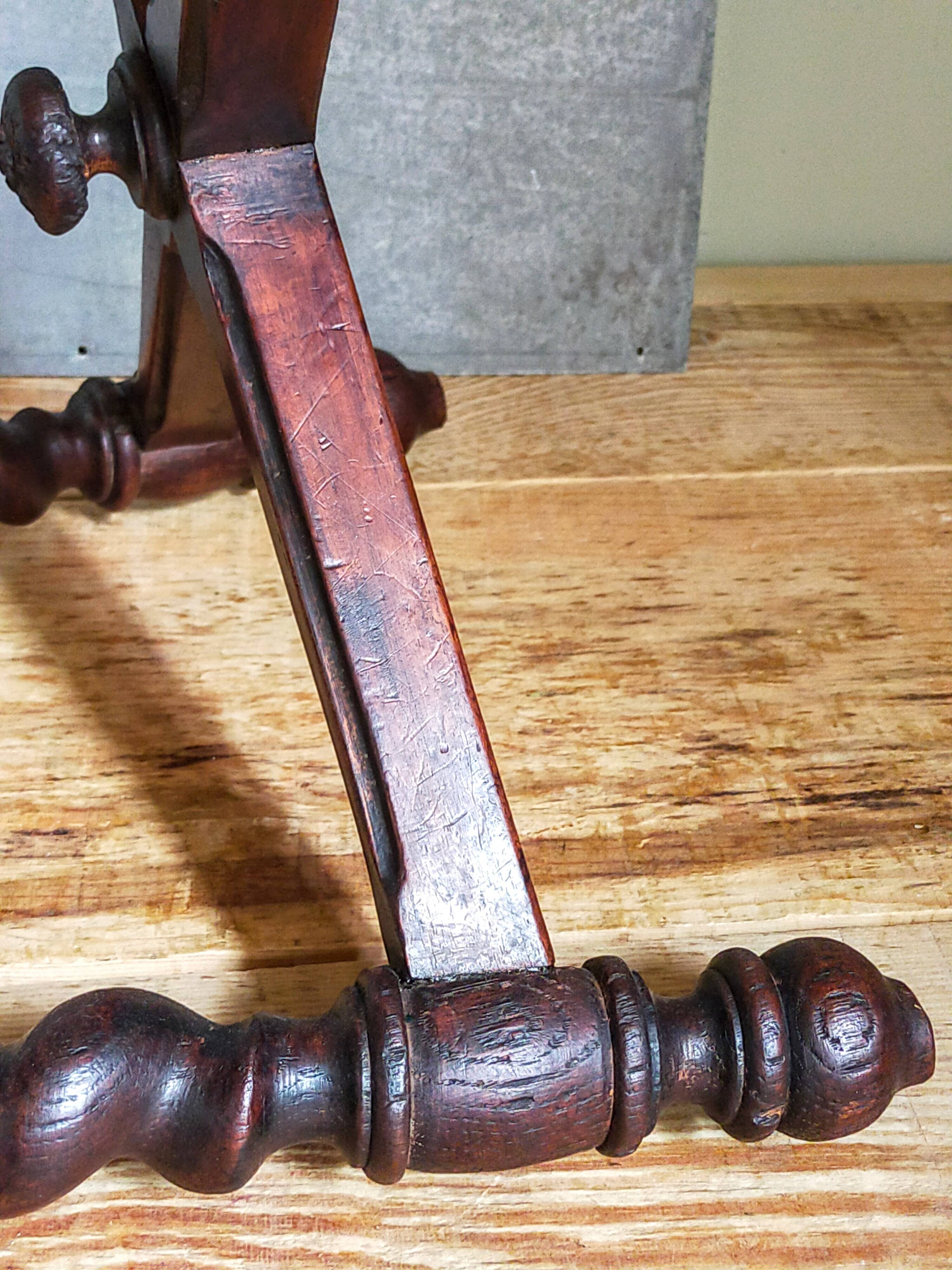 Antique stool in turned and carved solid wood