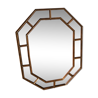 Mirror with parecloses