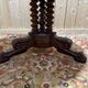 Round tripod gueridon from the Empire period with claw feet in mahogany and marble.