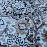 Hand-knotted Persian silk rug