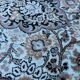 Hand-knotted Persian silk rug