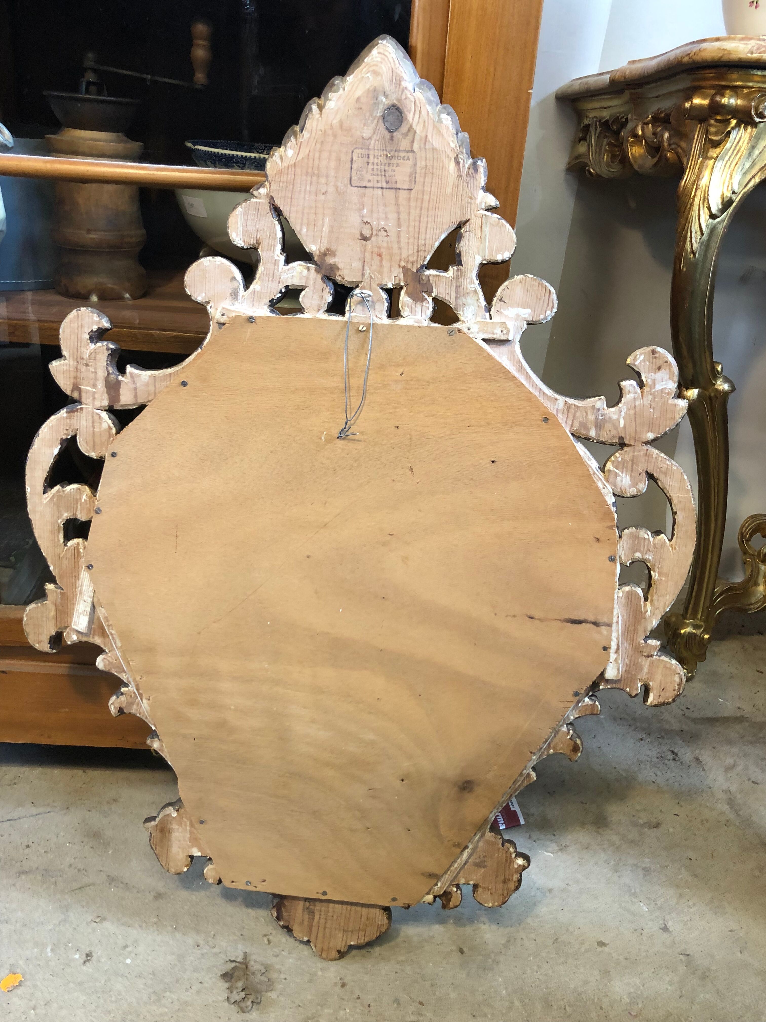 Mirror style baroque oval sculpture wood blown gold leaf