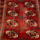 Red wool carpet, geometric pattern.
