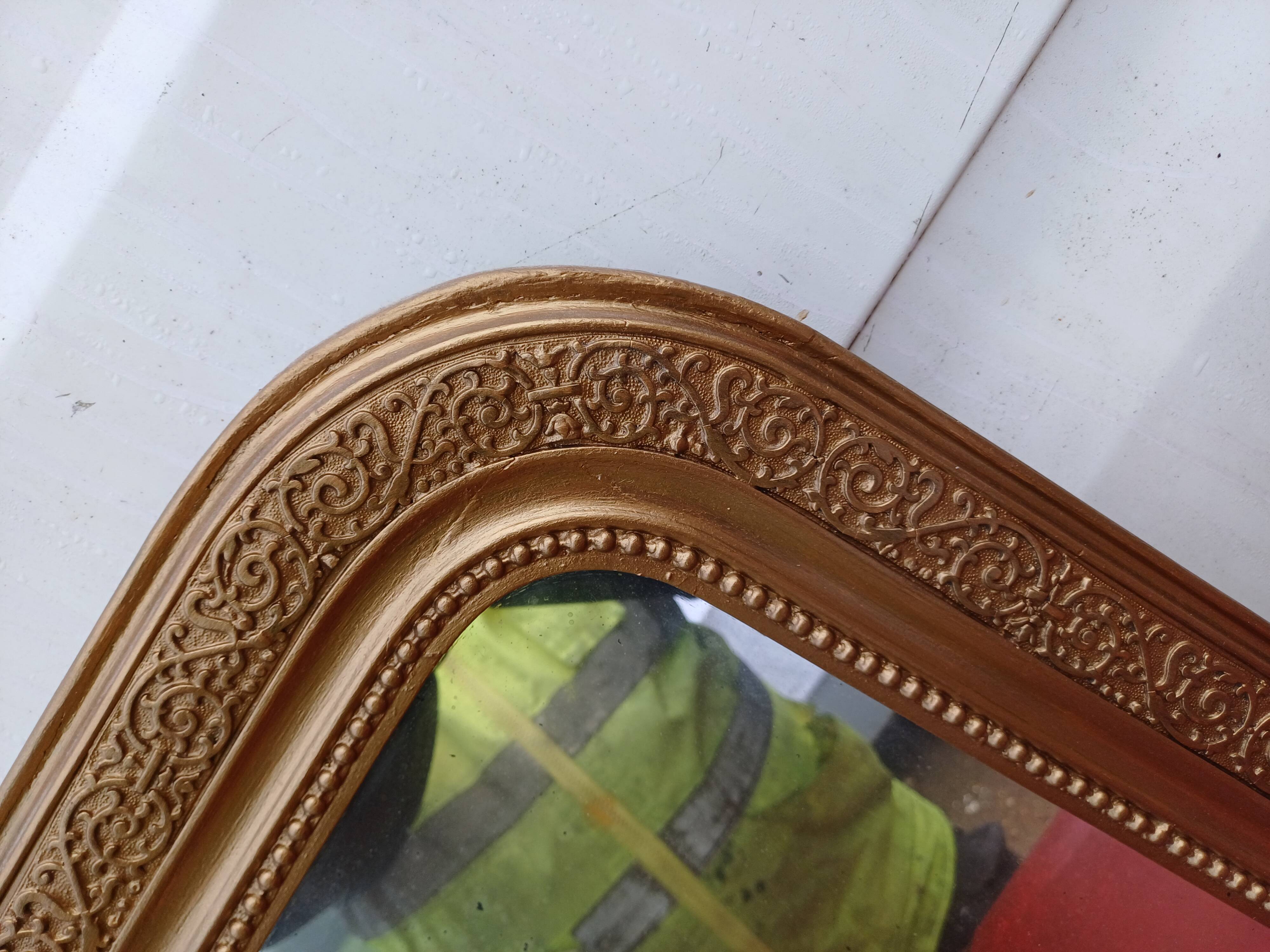 19th century wood and gilded stucco mirror