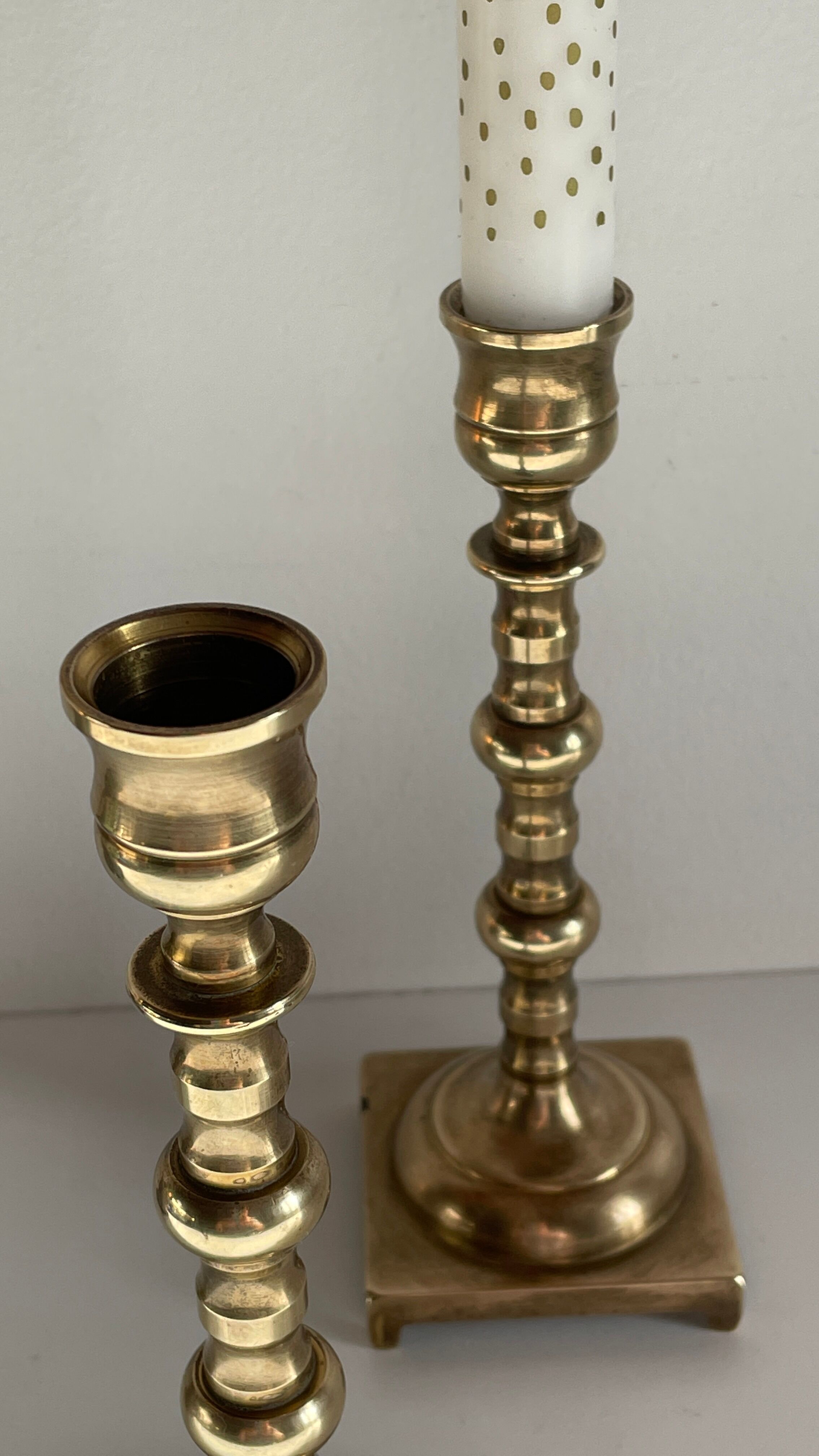 Pair of brass candle holders made in England