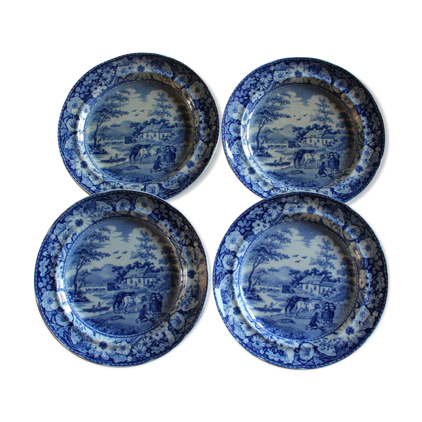 Lot of 4 flat plates in English porcelain "Native"