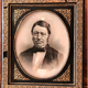 Black and gilded ebonite frame, wood and plaster 19th century