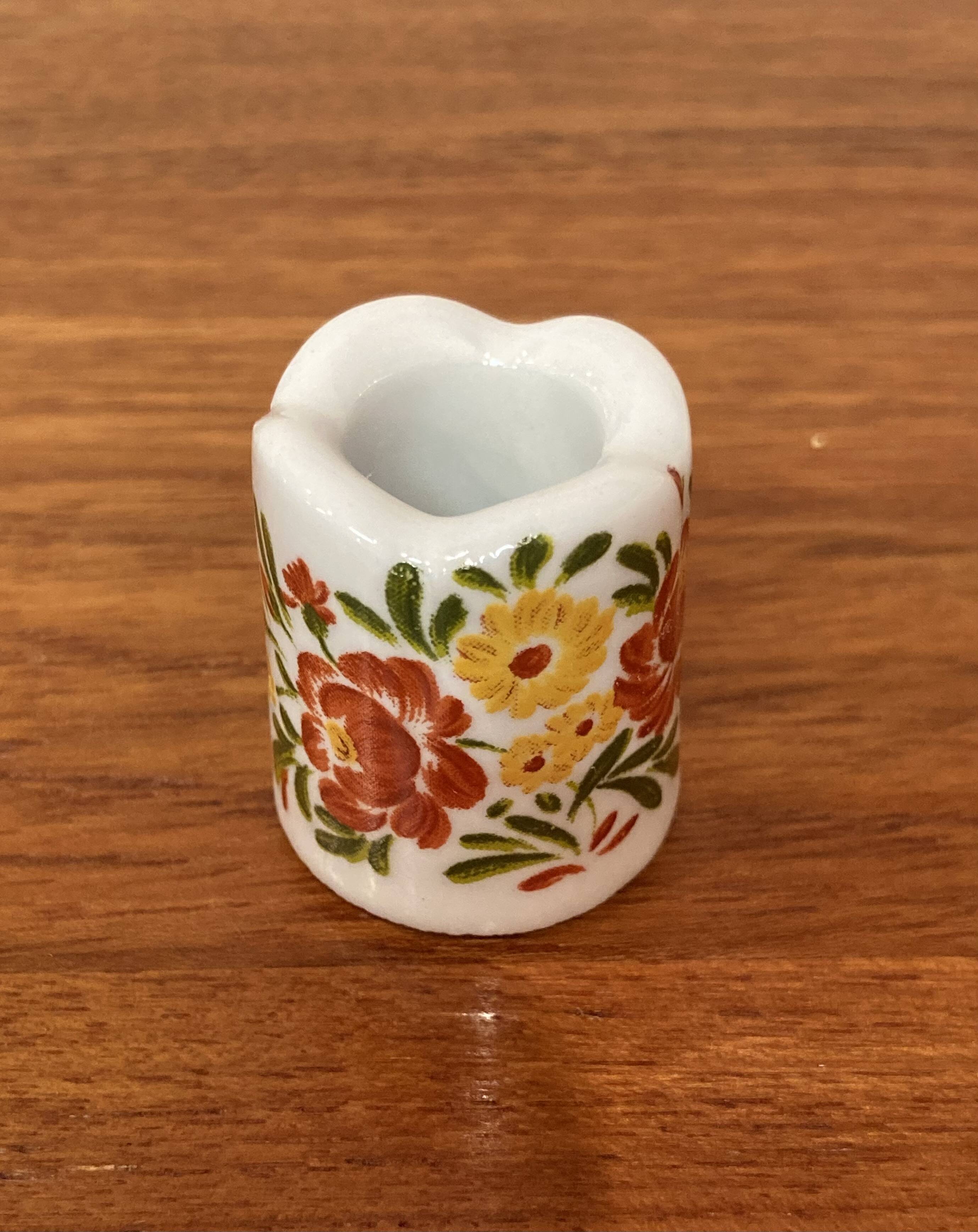 Set of ten 1950s design candle holders.