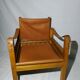 Pair of safari leather armchairs 50s