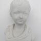 Child bust in biscuit. Capodimonte .