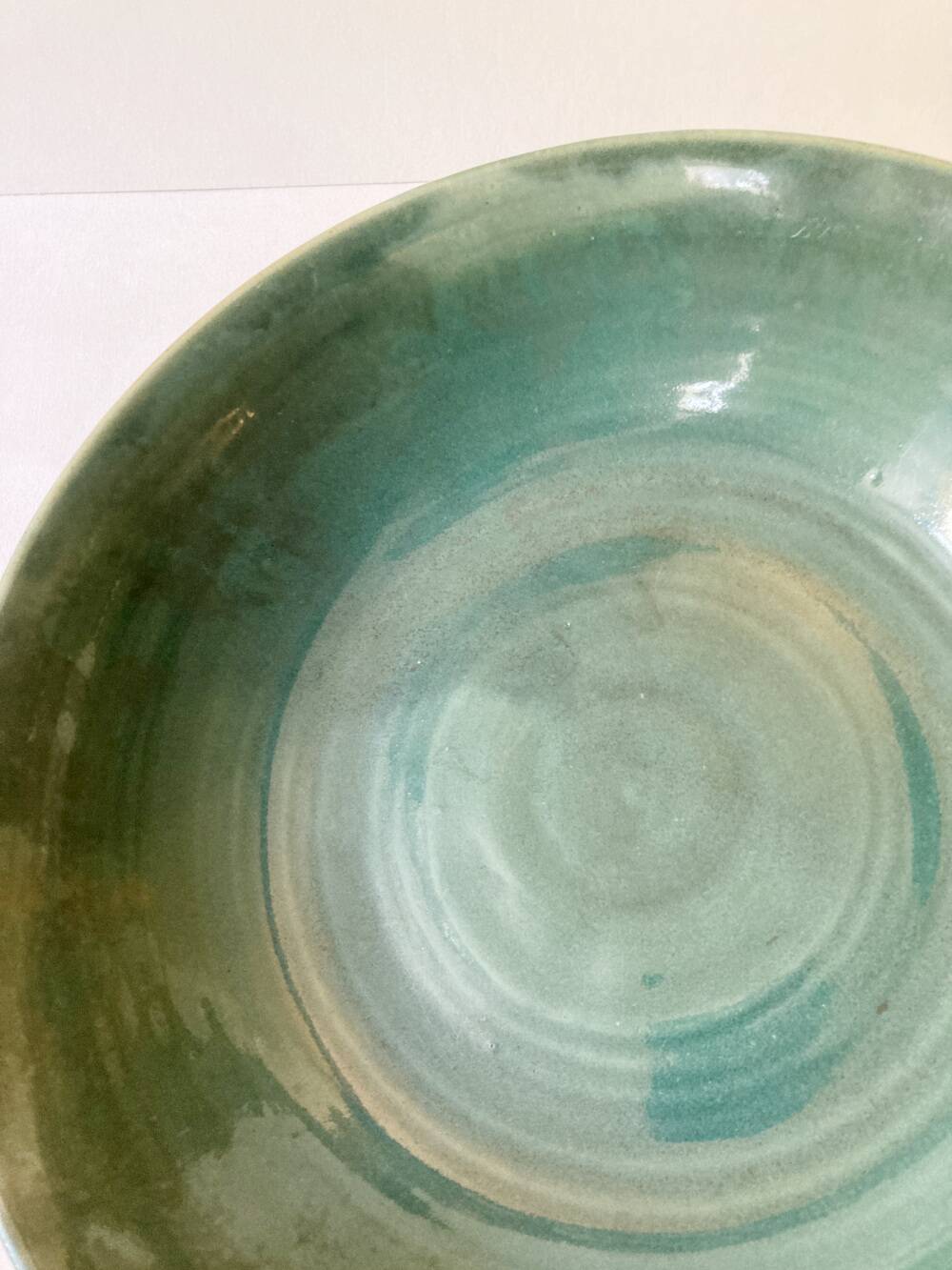 Celadon green stoneware dish signed