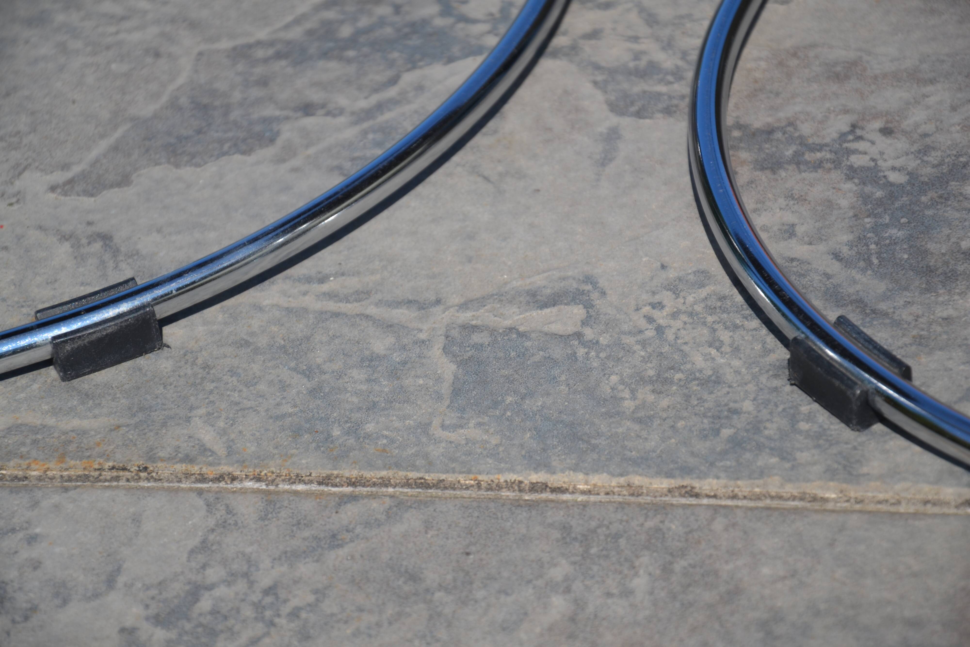 4 chrome and leather chairs designed by Italy