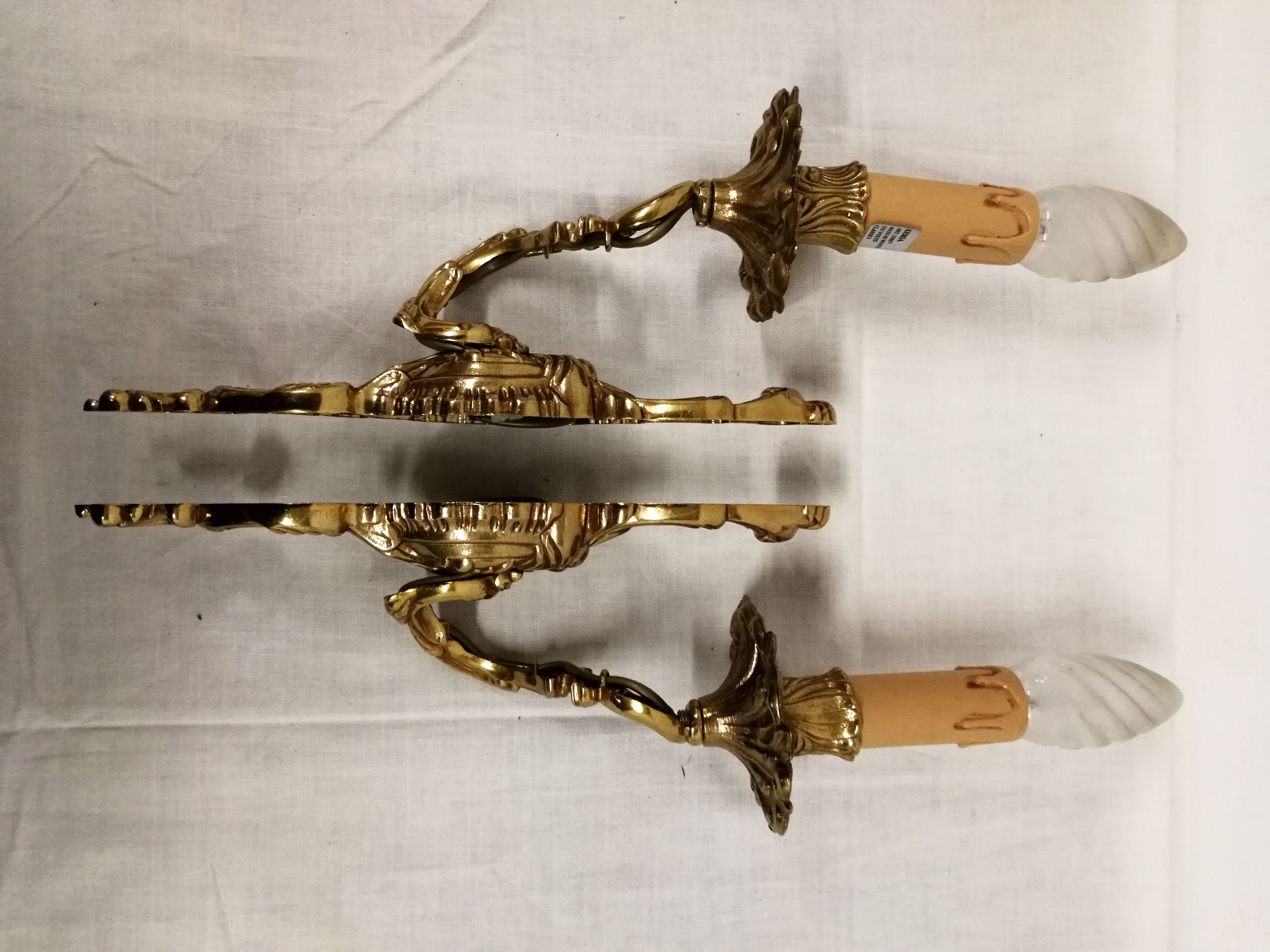 Pair of bronze wall lamps