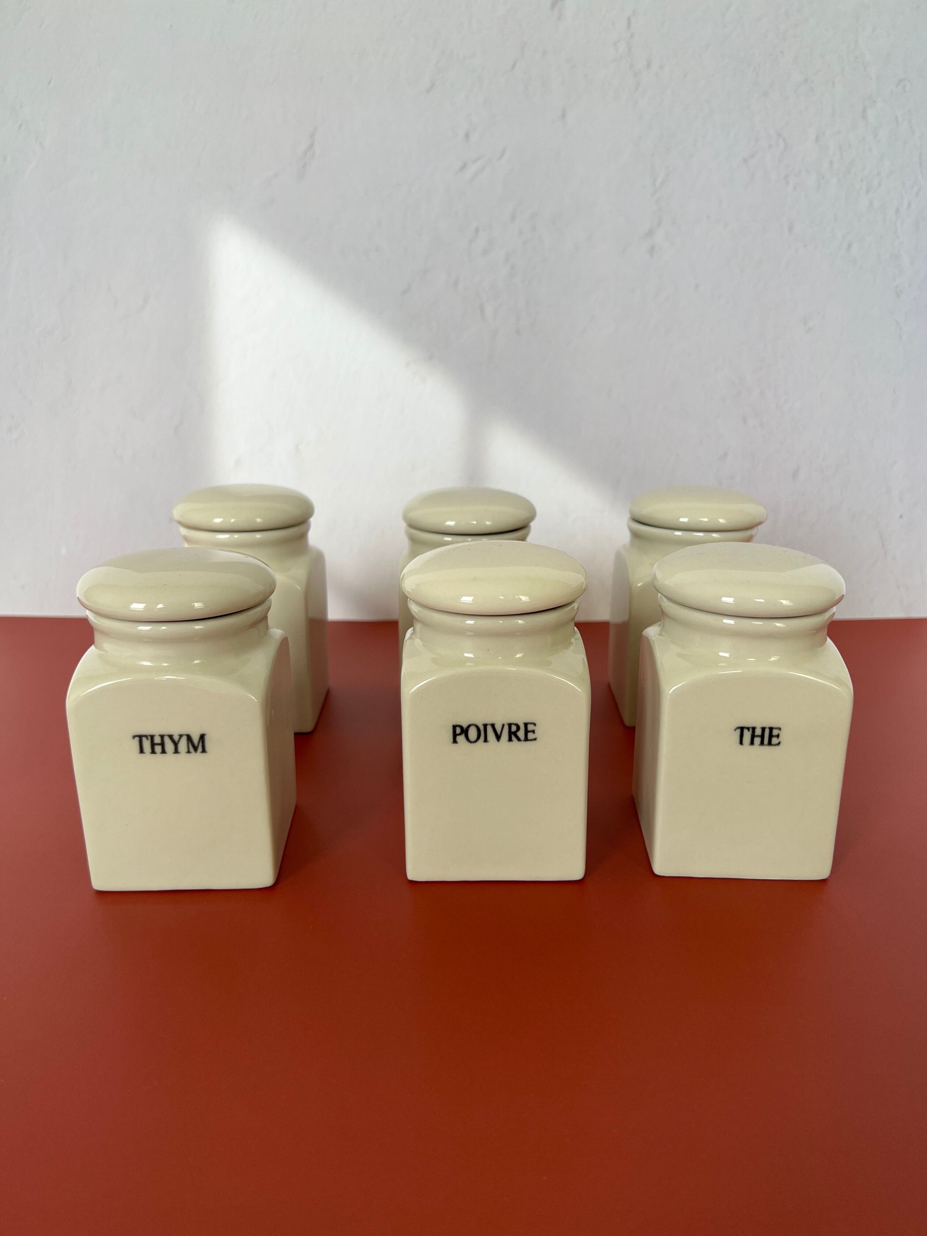 Set of vintage porcelain spice jars