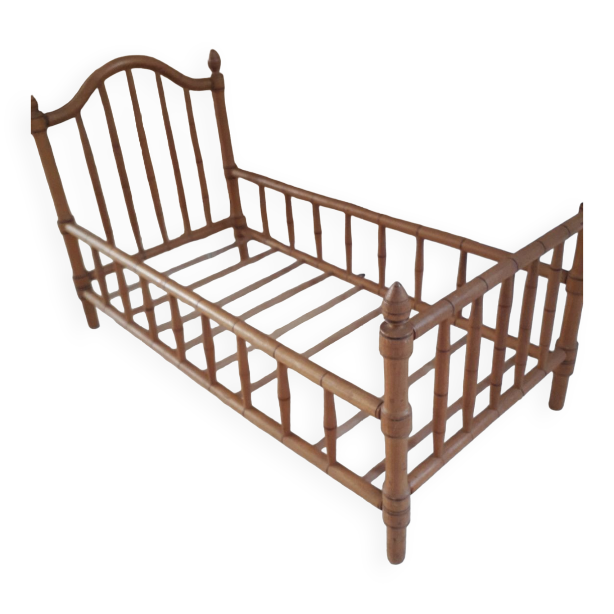 Old wooden doll's bed