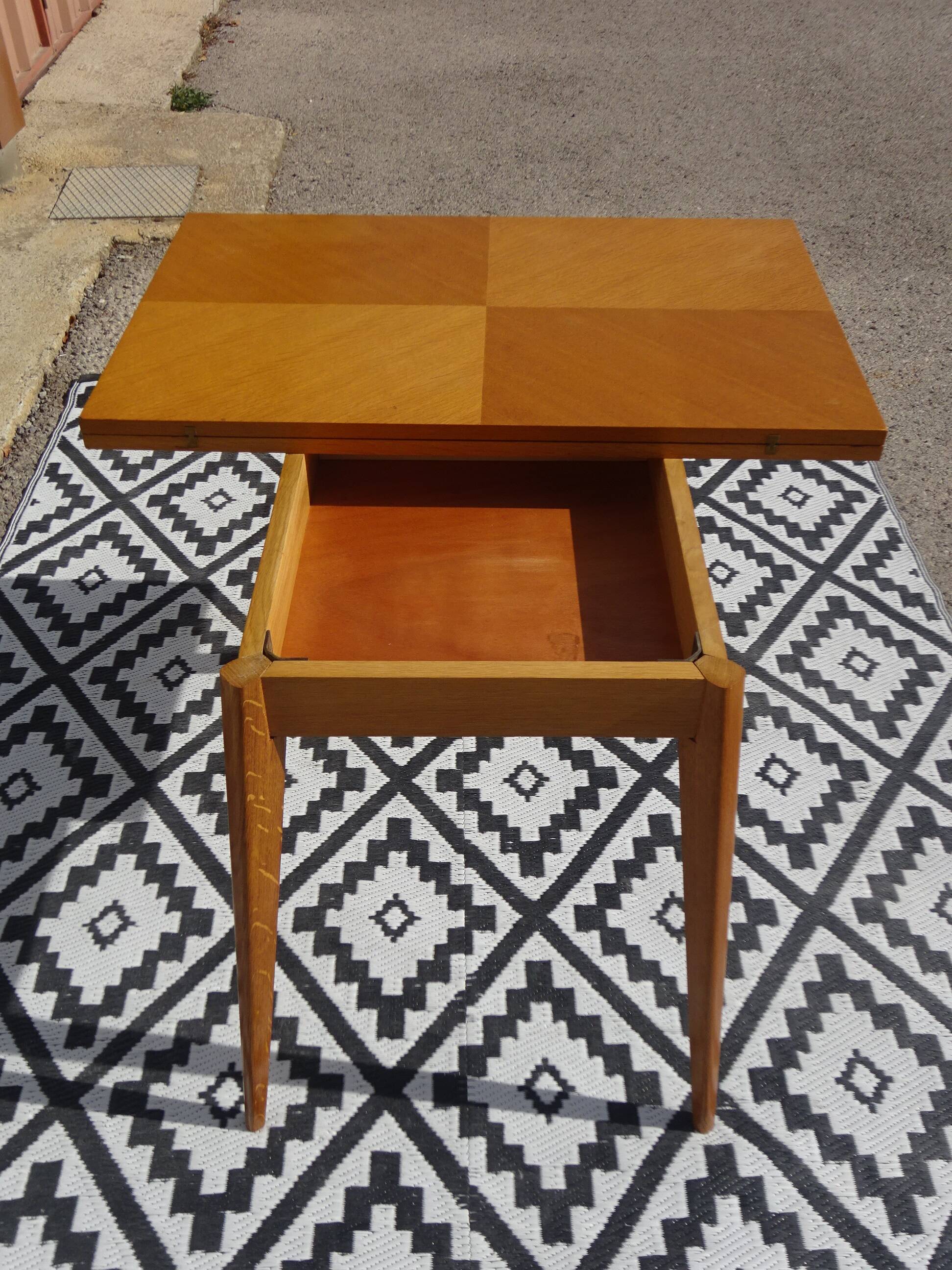Scandinavian portfolio table model "half-century" by SAM