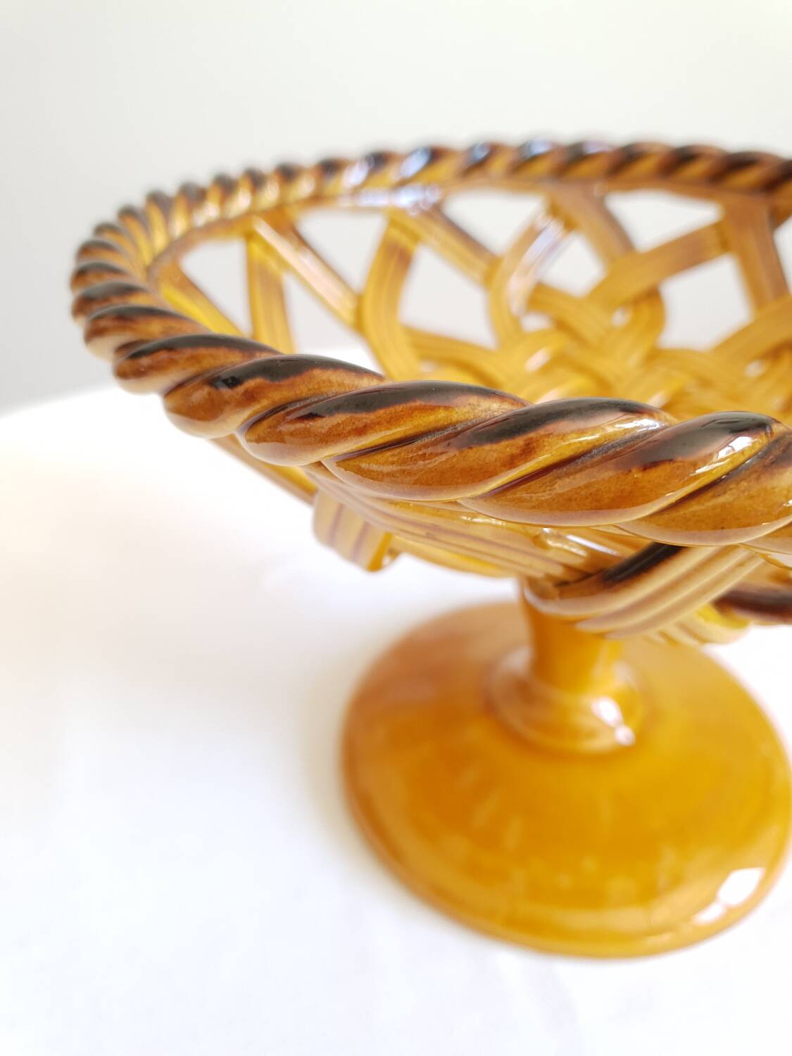 Braided bowl on ceramic base
