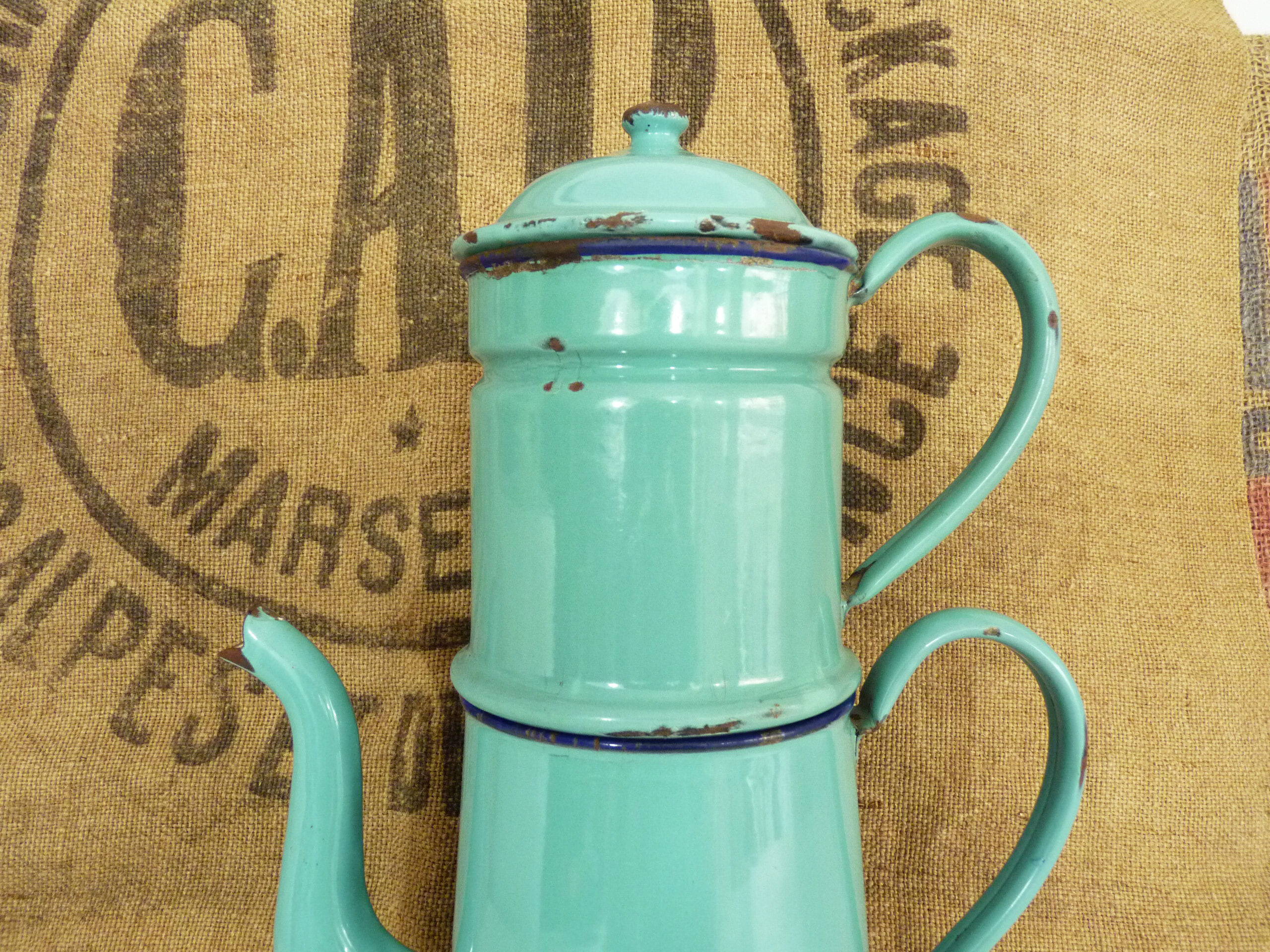 Old coffee maker in pastel blue enamelled sheet