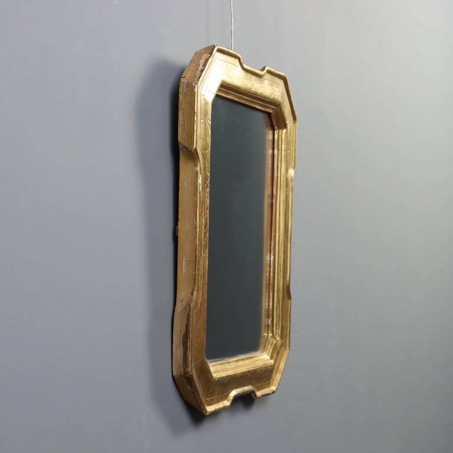 Antique cabaret mirror in gilded wood, Italy, mid-19th century.