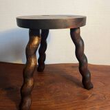 Round wooden tripod stool