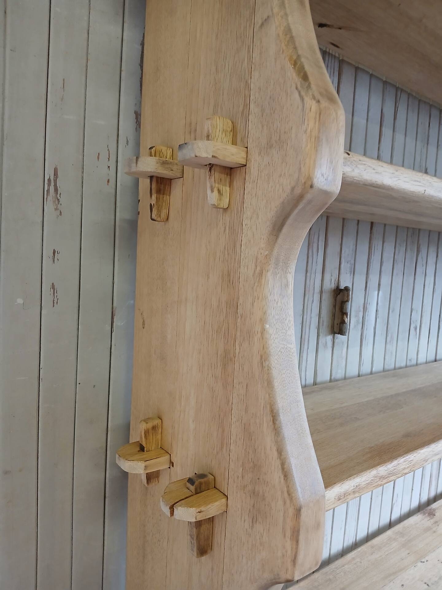 Solid wood shelf in brutalist style