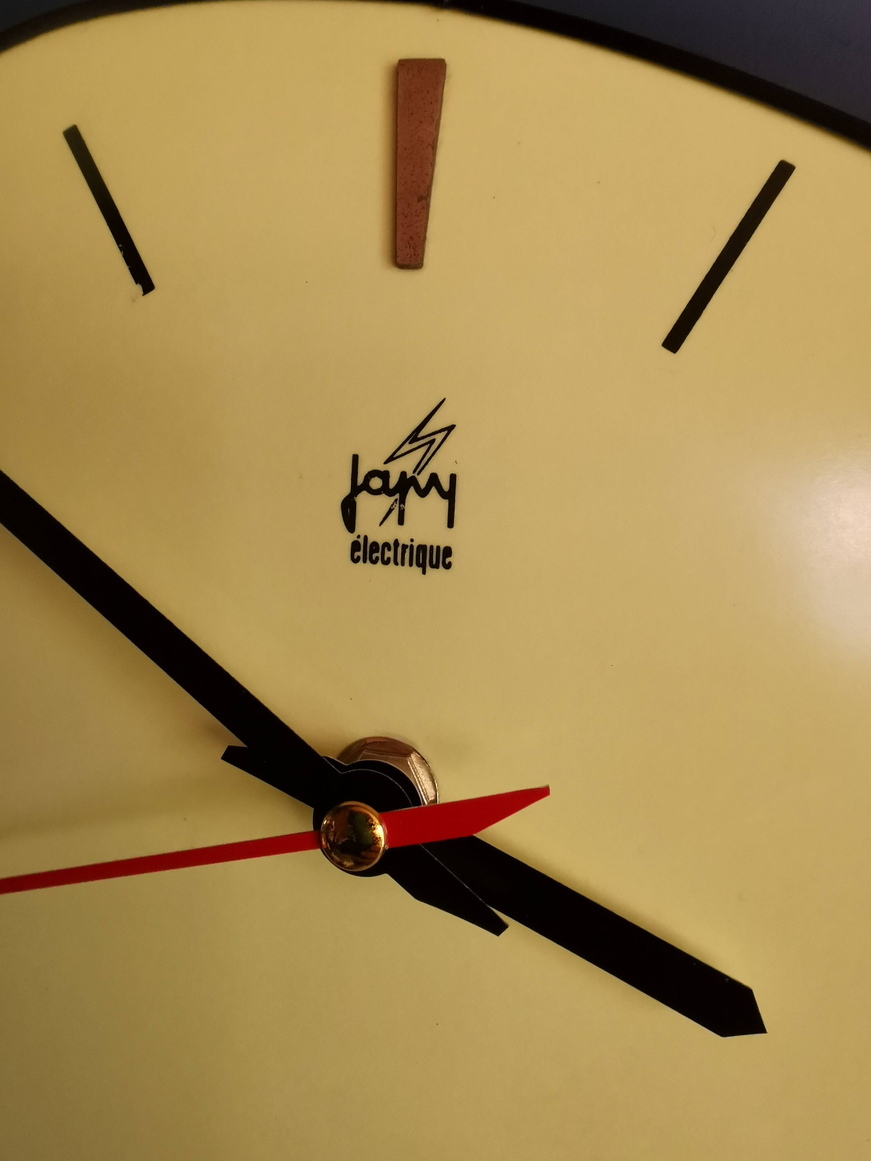 Vintage Formica clock silent asymmetrical wall pendulum "Yellow Japy"