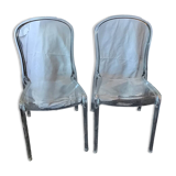 2 transparent plexiglass chairs