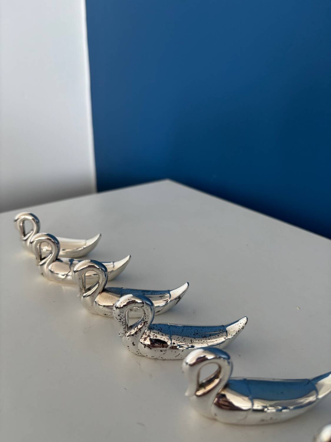 8 vintage silver-plated swan knife rests