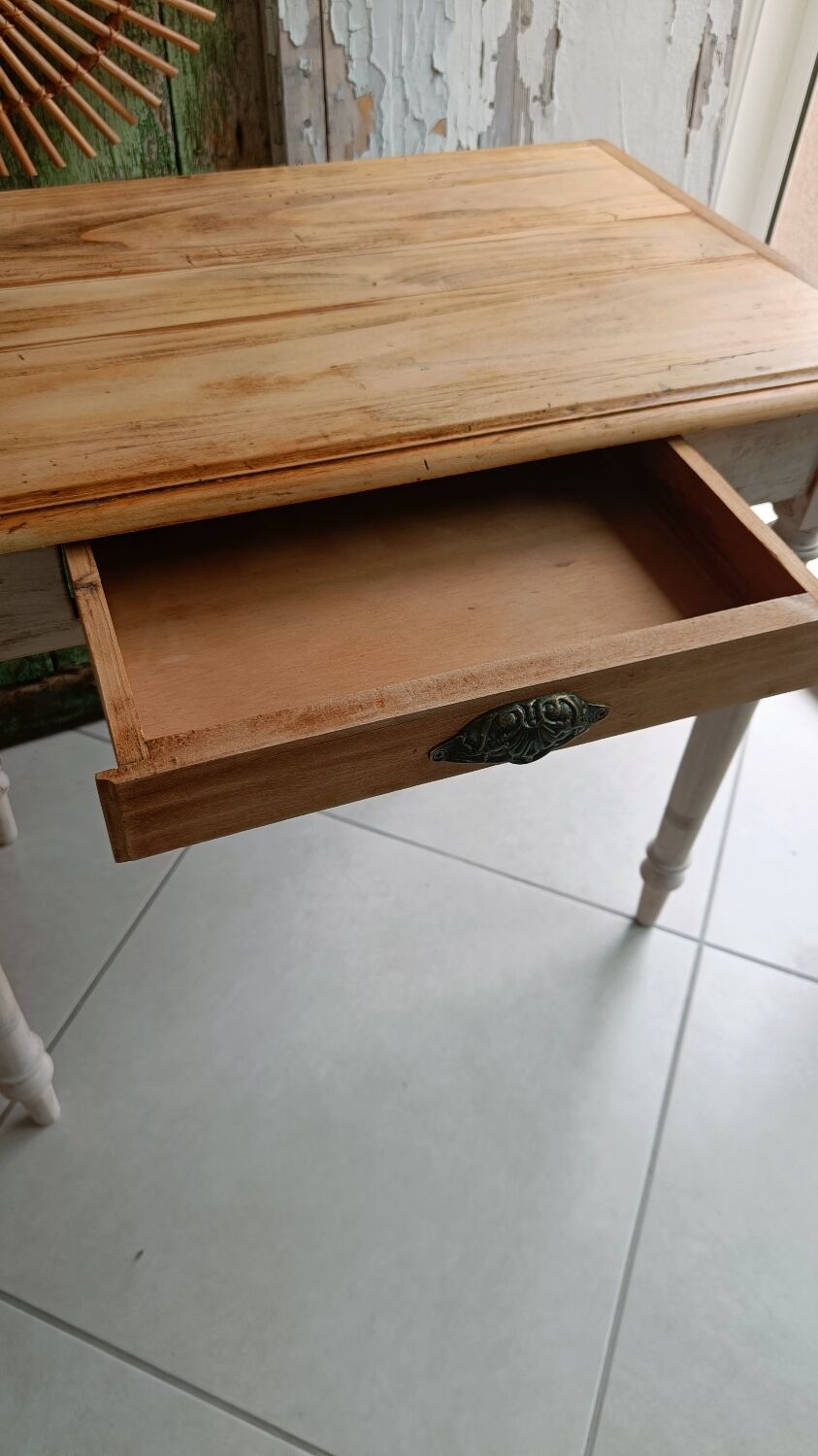 Antique wooden desk with a patinated base