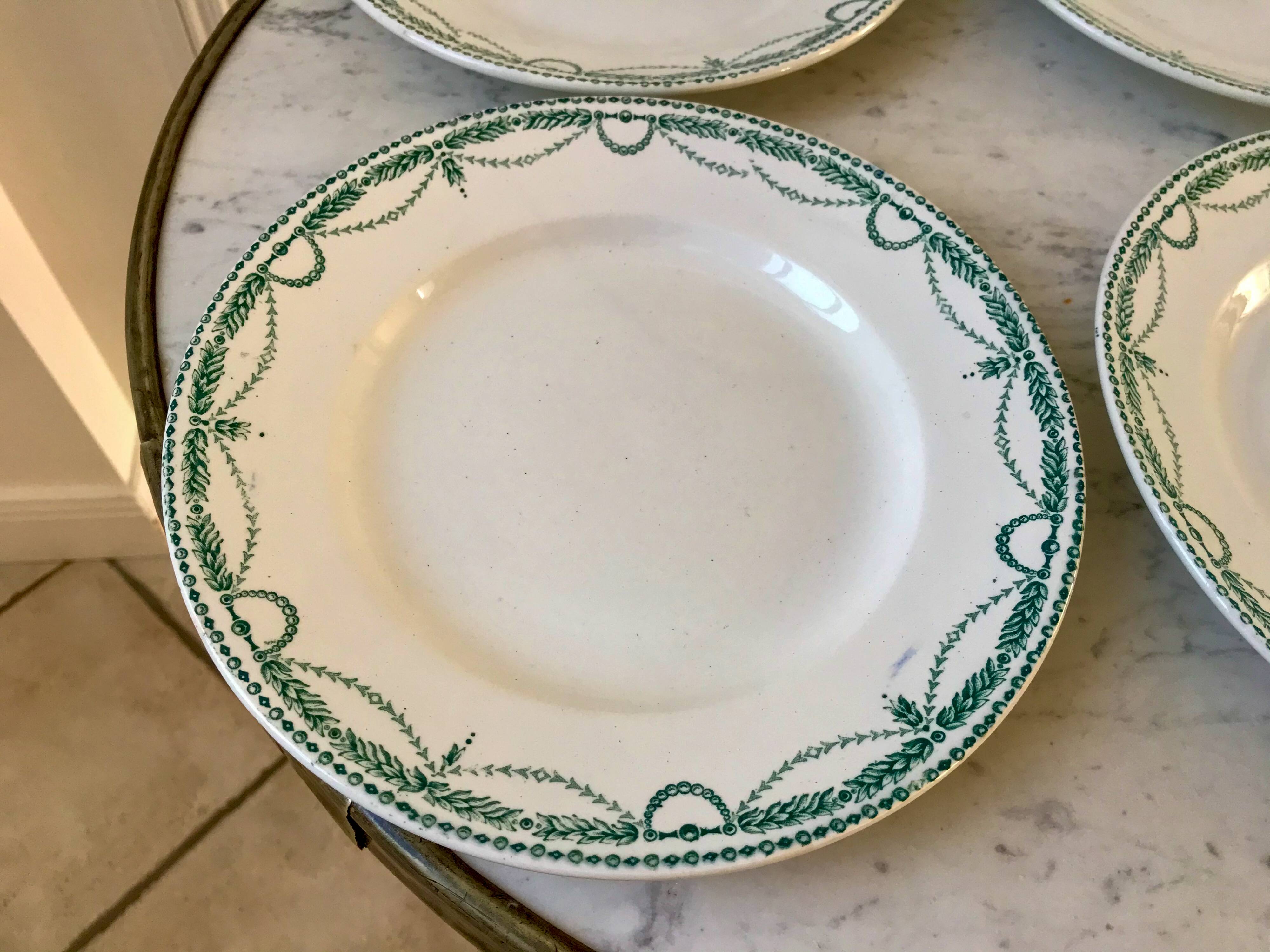 set of 4 flat plates in Terre de Fer Saint Amand model René 19th century