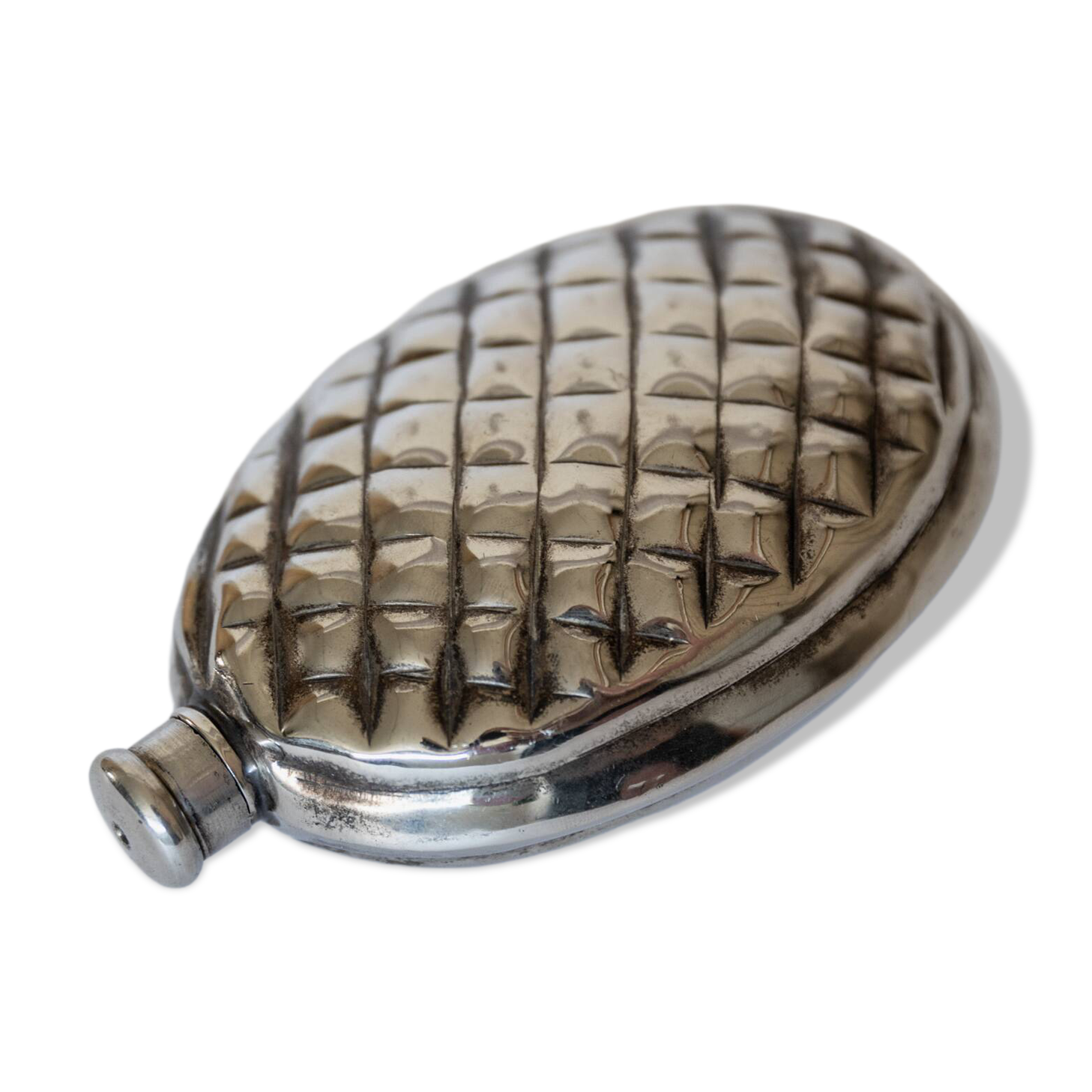 Vintage 1950s silver-plated flask in the shape of a pine cone.