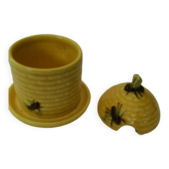 Small beehive shaped honey pot with bee