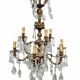 Large antique chandelier with 9 lights, bronze and cut glass pendants, cherubs, style