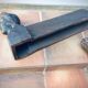 Pair of cast-iron chenet characters with laurels
