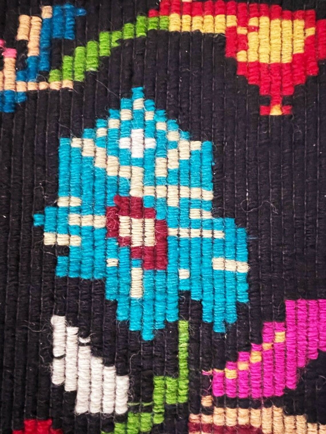 Romanian wool carpet floral design with green border on black background 180x153cm