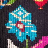 Romanian wool carpet floral design with green border on black background 180x153cm